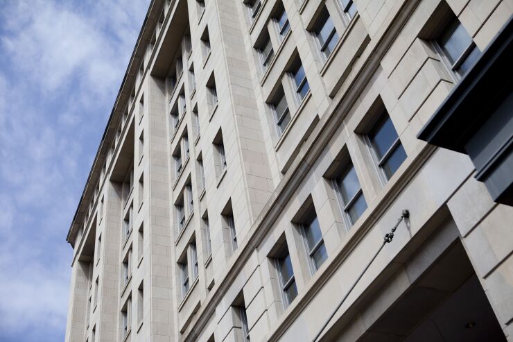 Carlyle to Manage Investments for Mortgage Fund Pivoting to CLOs