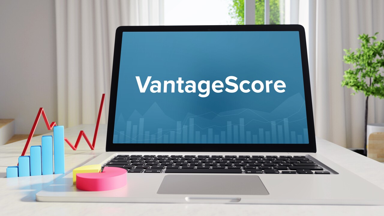VantageScore – Statistics/Business. Laptop in the office with term on the Screen. Finance/Economy.