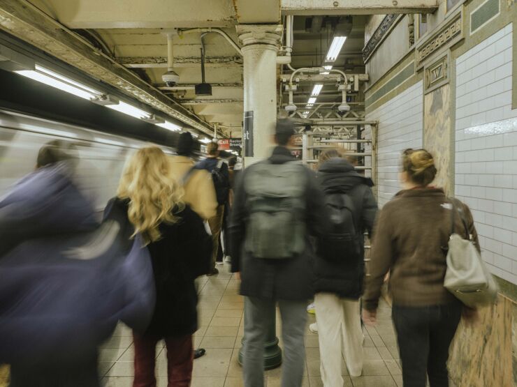Commuters during morning rush hour at the Wall Street subway station in New York, US, on Tuesday, Feb. 7, 2023. Nowhere is the economic cost of remote work more pronounced when it comes to spending than in the world’s leading financial center: New York. Photographer: Ismail Ferdous/Bloomberg