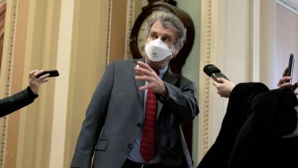 “For too long this committee did the bidding of Wall Street and big corporations,” says Senate Banking Committee Chairman Sherrod Brown.