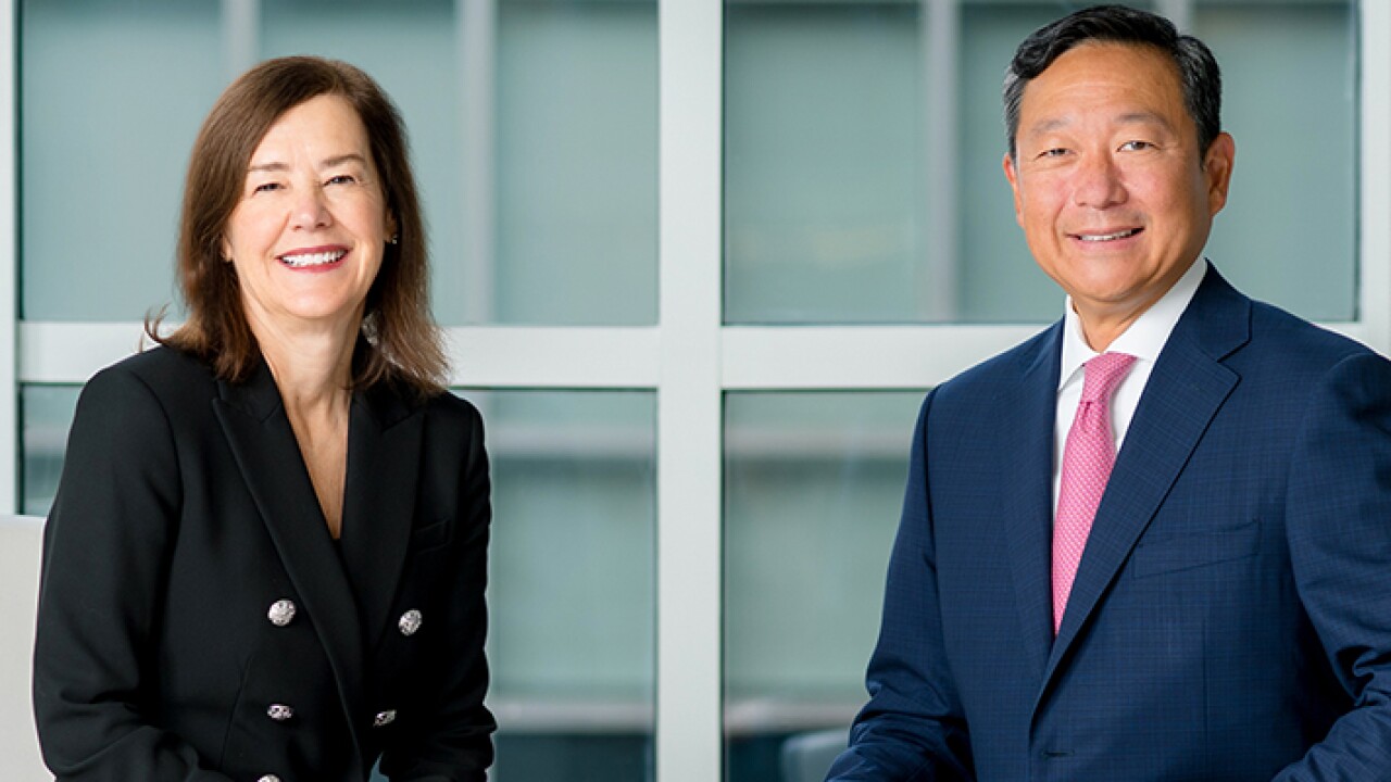 Meredith Hathorn, chair of the board of directors and Mark Kim, MSRB CEO