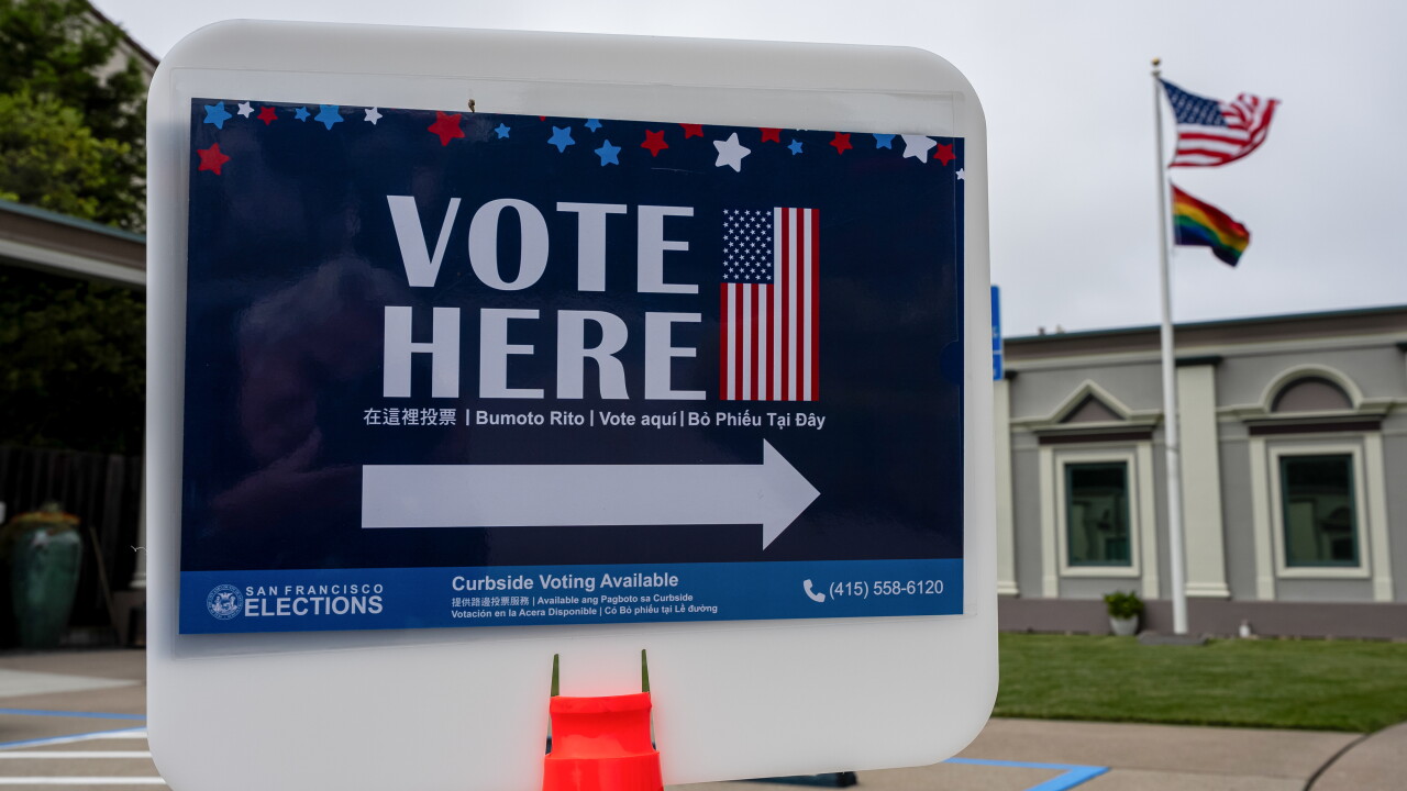 Vote here sign