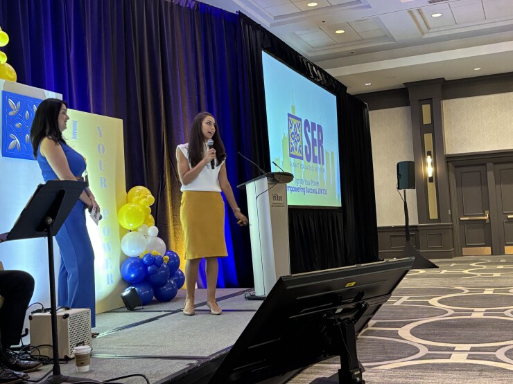 SER Summit founders Vanessa Martinez (left) and Ana Trujillo Limón spoke in opening remarks at this week's annual event for Latinos in wealth management and other financial fields.