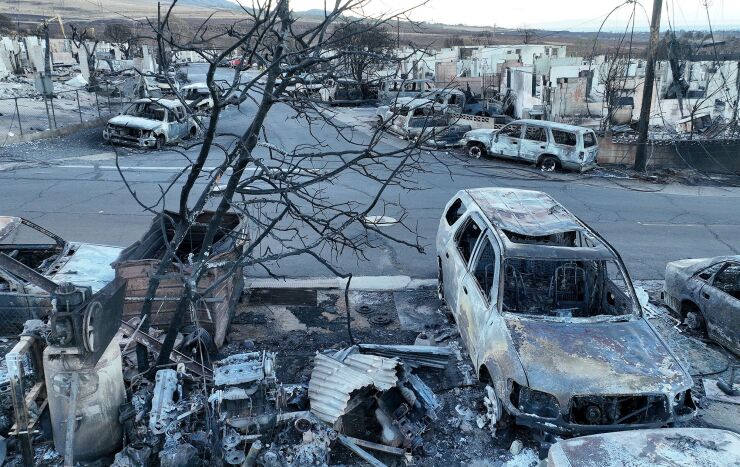 Photo of burned cars and homes in Lahaina, Hawaii, on Aug. 18, 2023
