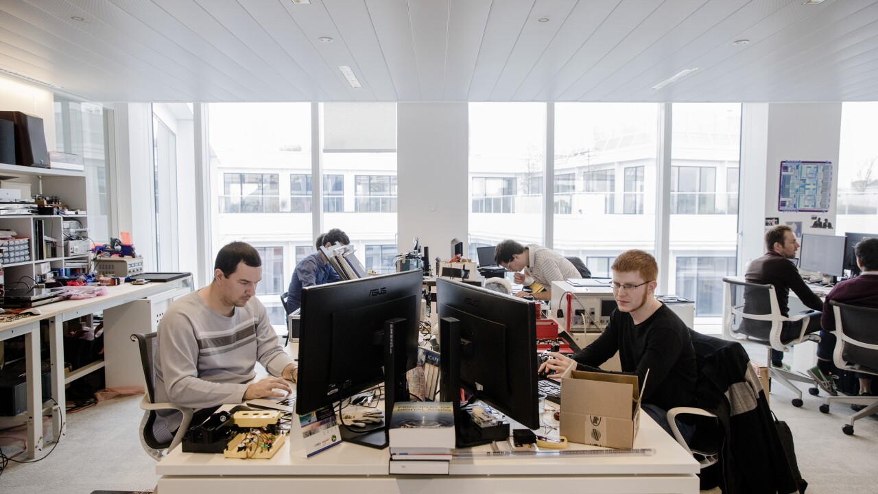 Engineers work in the laboratory at the Devialet SAS headquarters in Paris, France, on Friday, Jan. 27, 2017. In November the Paris-based company, which employs 250 staff and generated 60 million in sales last year, raised $106 million from a suite of investors that ranged from rapper Jay Z to the Qatari sovereign wealth fund.