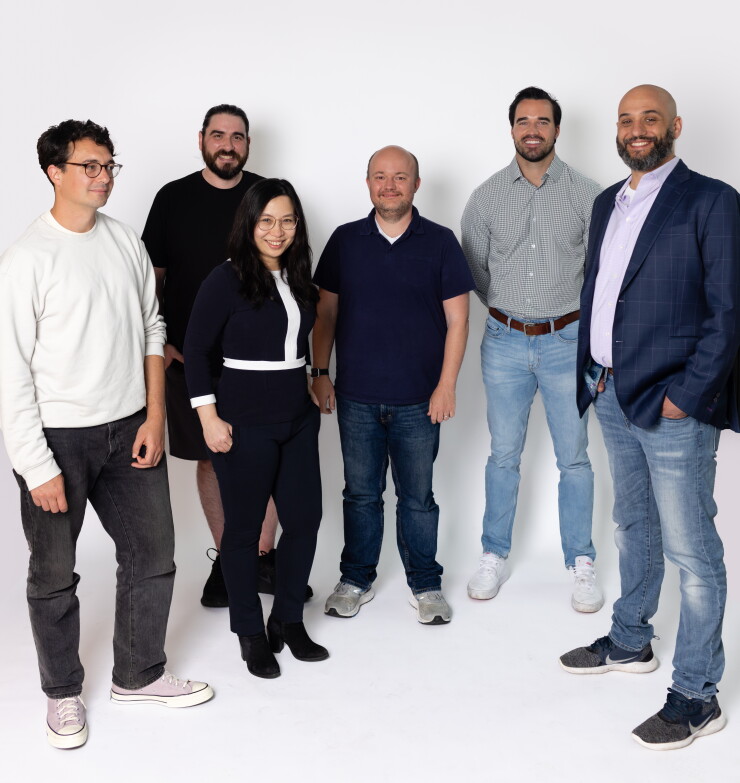 Meanwhile execs group shot.jpg