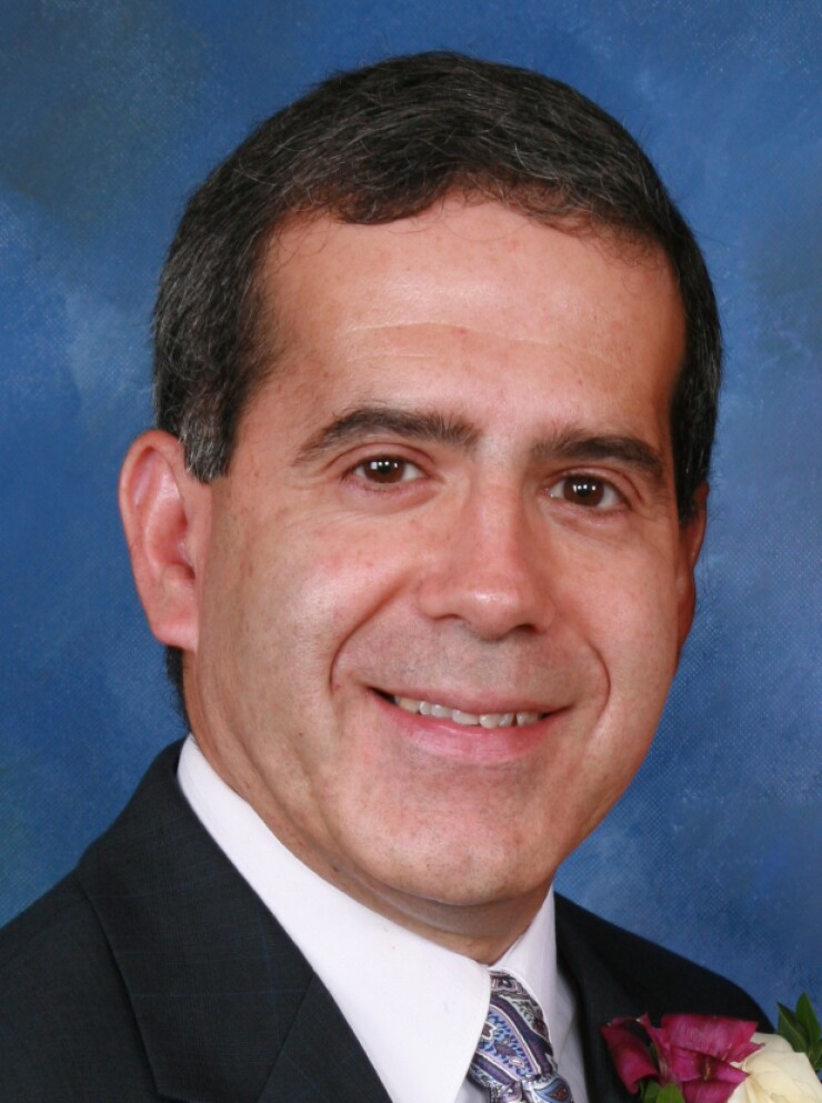 Albert Pinho, interim CEO of Naveo Credit Union