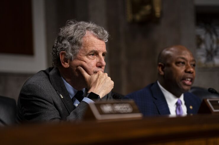 Sherrod Brown and Tim Scott