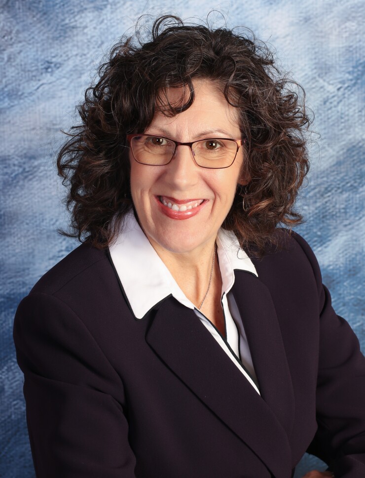 Amy Irvine, Rooted Planning Group