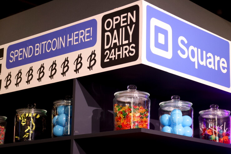 A picture of bitcoin signage at a crypto conference.