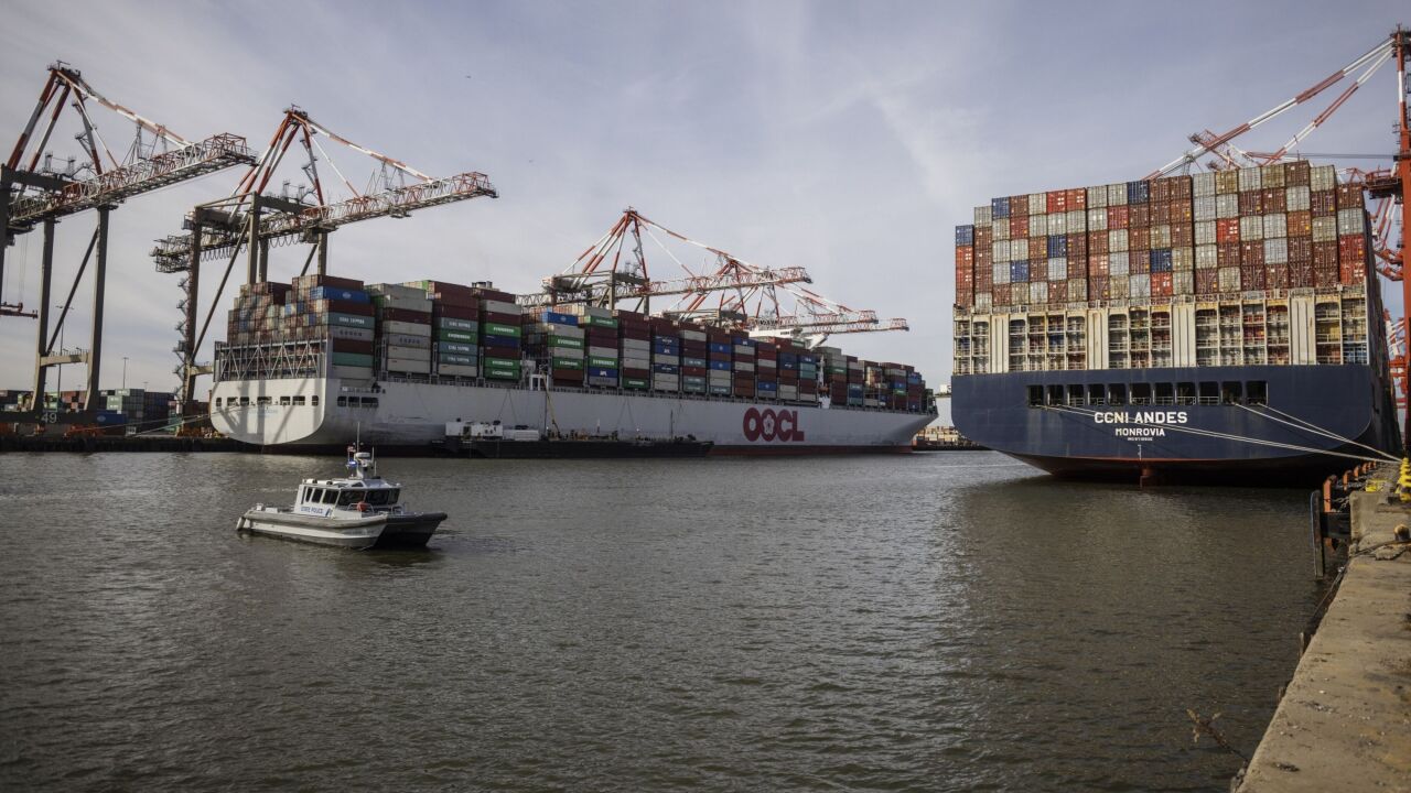 Cargo vessels carrying shipping containers at the Port of Newark, New Jersey, on Dec. 17, 2021