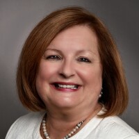 Portrait of Patti Clement, executive vice president of HUB International