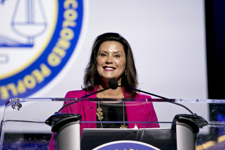 Gretchen Whitmer, governor of Michigan, smile while speaking during the 110th NAACP Annual Convention in Detroit, Michigan, U.S., on Monday, July 22, 2019.