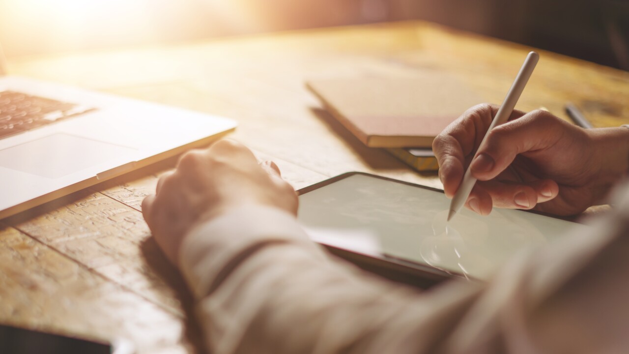 Male hands with digital tablet