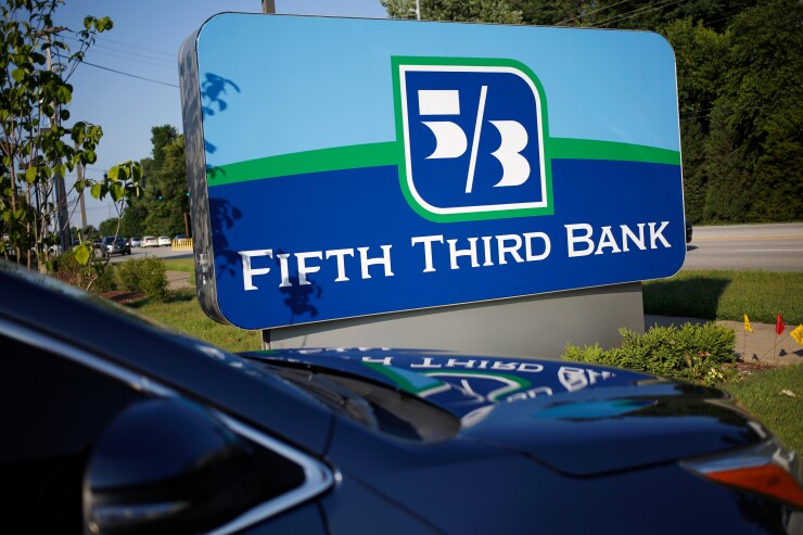 Signage is displayed outside a Fifth Third Bank branch in Louisville, Kentucky.