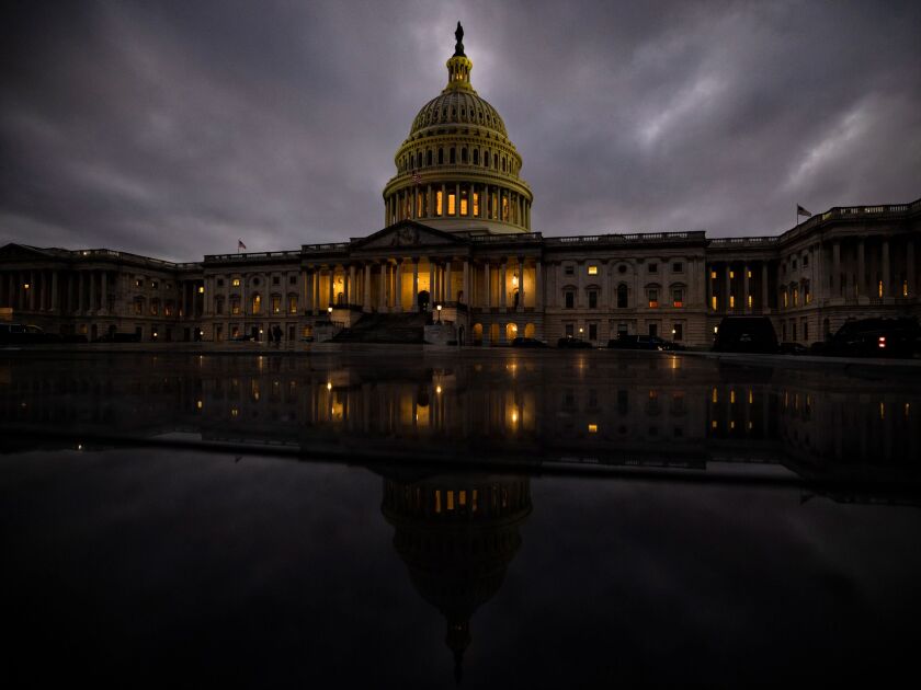 WASHINGTON, DC - DECEMBER 20: Dusk falls over the US Capitol building on December 20, 2020 in Washington, DC. Republicans and Democrats in the Senate finally came to an agreement on the coronavirus relief bill and a vote is expected later today or tomorrow. (Photo by Samuel Corum/Getty Images) Photographer: Samuel Corum/Getty Images North America