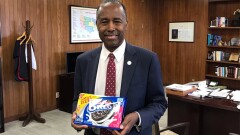 HUD Secretary Ben Carson tweeted out a picture of himself posing with a bag of Oreo Cookies after he misunderstood a question from Rep. Katie Porter, D-Calif., who asked about "REO."