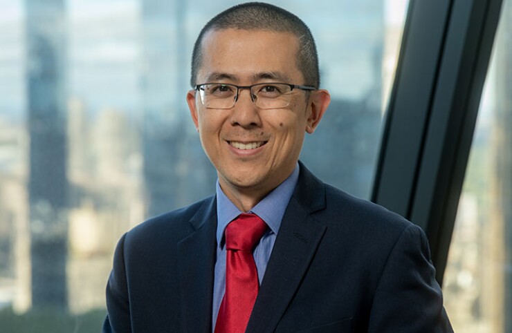 Eric Kim Fitch Ratings