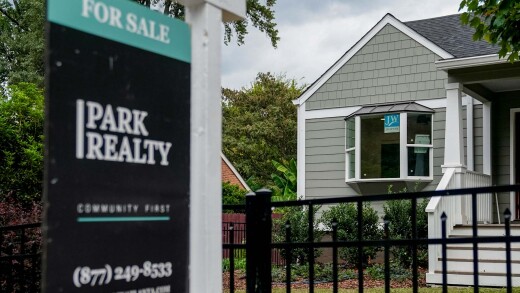 For Sale sign in front of Atlanta home
