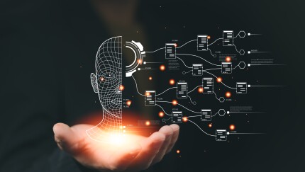 glowing hand projecting hologram of half a face and half file icons