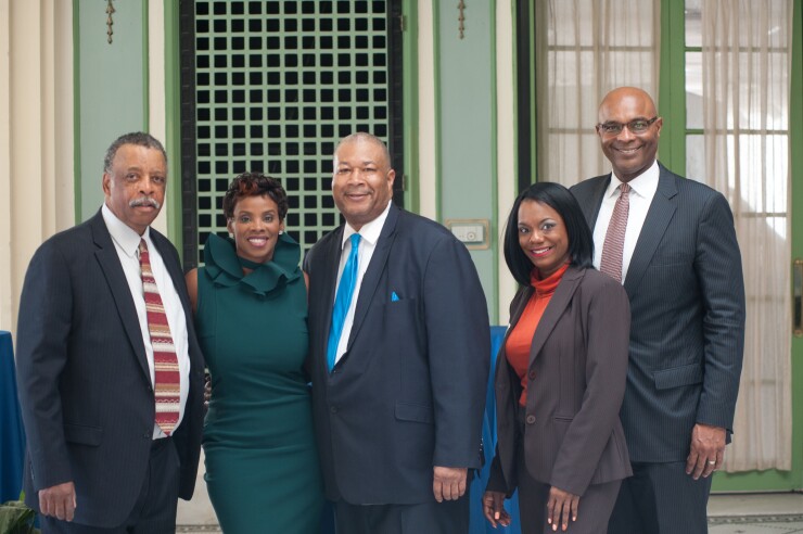 Newell and the Seaway team. From left: Al Bass, past president of Seaway; former news anchor and Seaway customer Darlene Hill; Seaway mortgage loan officer Virgil Booker; seaway buisness development officer Franja Brown; and Daryl Newell.