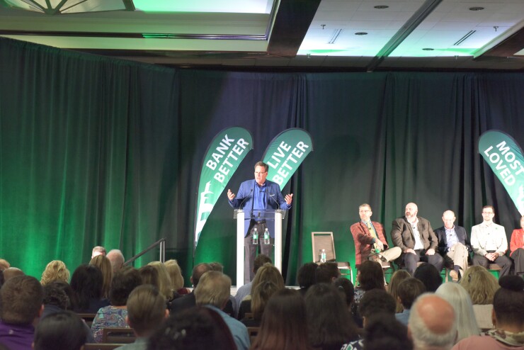 Coastal Federal Credit Union CEO Chuck Purvis addresses employees during an all-staff town hall meeting in early 2018.