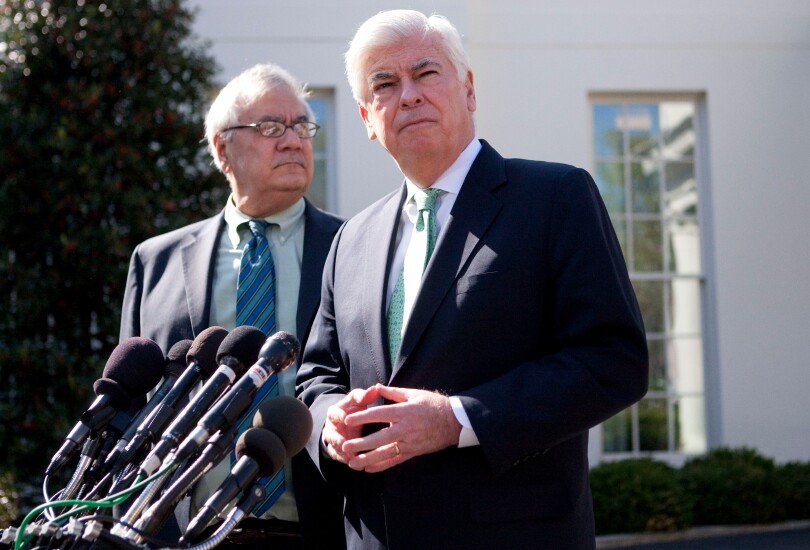 Sen. Chris Dodd, right, speaking at a news conference with Rep. Barney Frank at the White House on March 24, 2010.