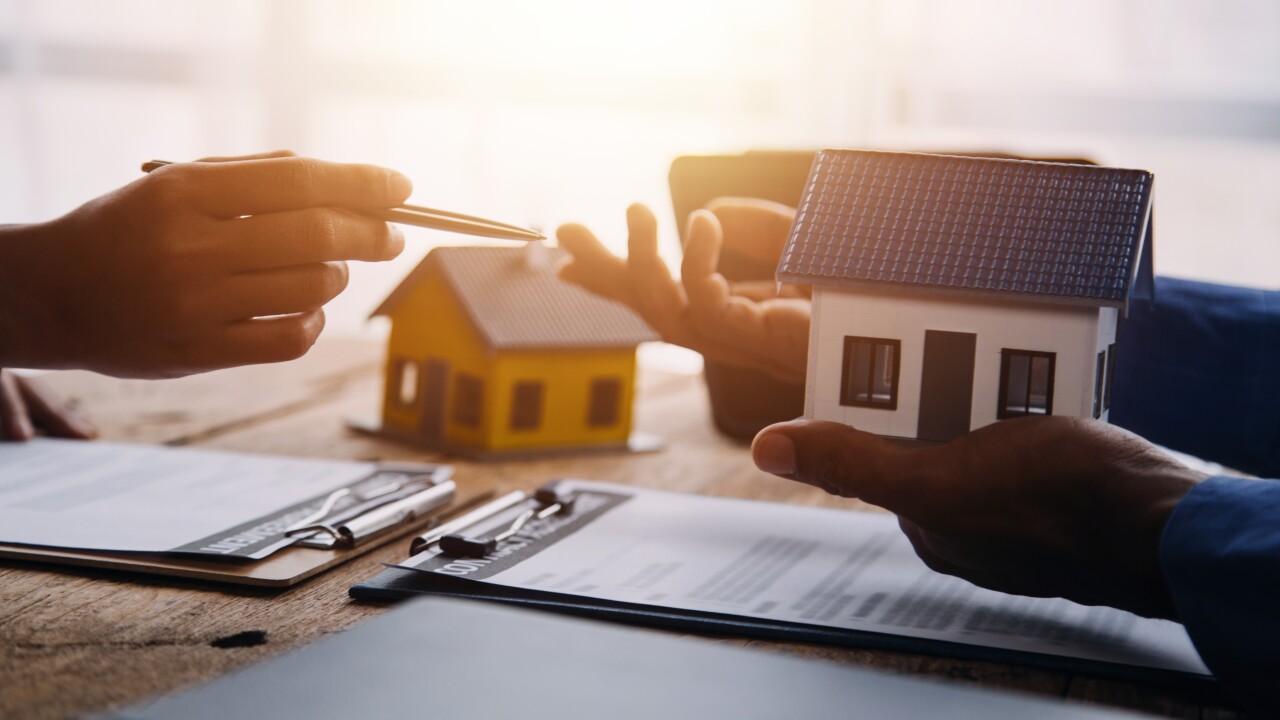 Real estate broker agent presenting and consult to customer to d