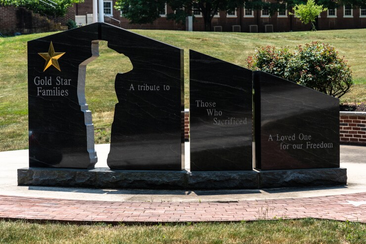 A former U.S. Army Reserve financial counselor has pleaded guilty to defrauding Gold Star military families.