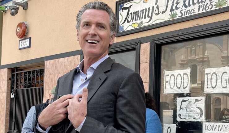 California Gov. Gavin Newsom in front of a Mexican restaurant in San Francisco on June 3, 2021