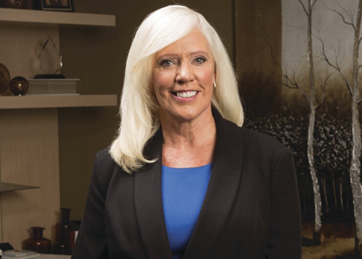 slide_Sandy Jelinski full office shot copy.jpg