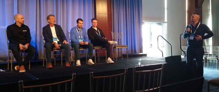 Ryan Hanley addresses panelists at InsurTech NY