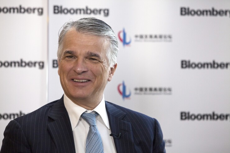 Sergio Ermotti, chief executive officer of UBS Group AG, speaks during a Bloomberg Television interview on the sidelines of the China Development Forum in Beijing, China, on Saturday, March 24, 2018.