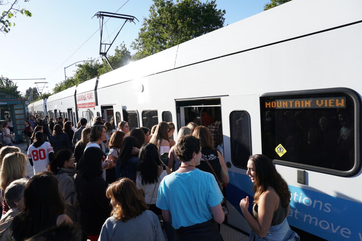 Passengers board a Santa Clara Valley Transportation Authority light rail train at Levi's Stadium in Santa Clara, California, on May 11. 2018.