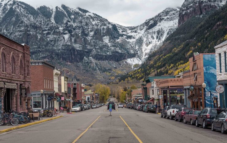 A view of Telluride, Colorado framed by surrounding mountains