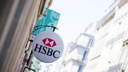 A sign outside the HSBC Holdings Plc headquarters on Champs Elysee in Paris