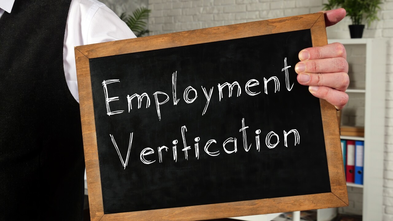 Career concept about Employment Verification with inscription on the piece of paper.