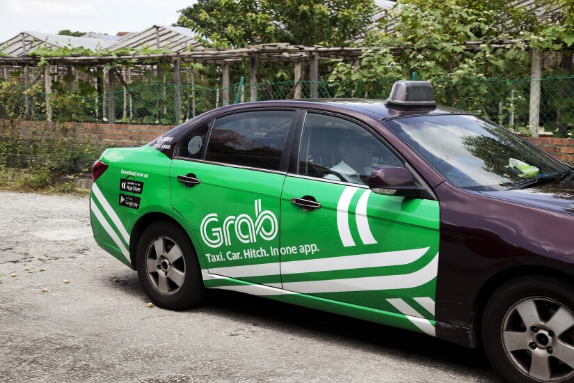 A Grab-branded taxi