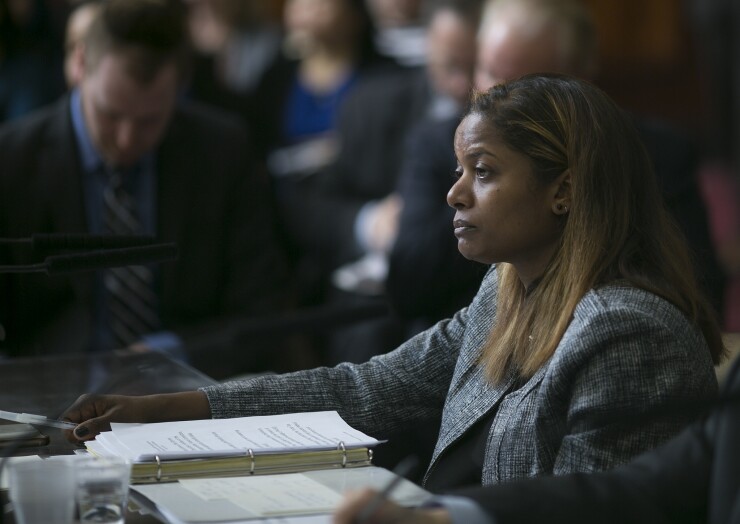 New York City Budget Director Melanie Hartzog takes questions at a city council capital budget hearing on March 20, 2018.