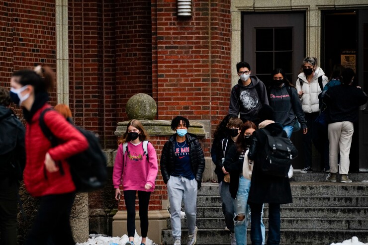 Lane Tech High School students exit school