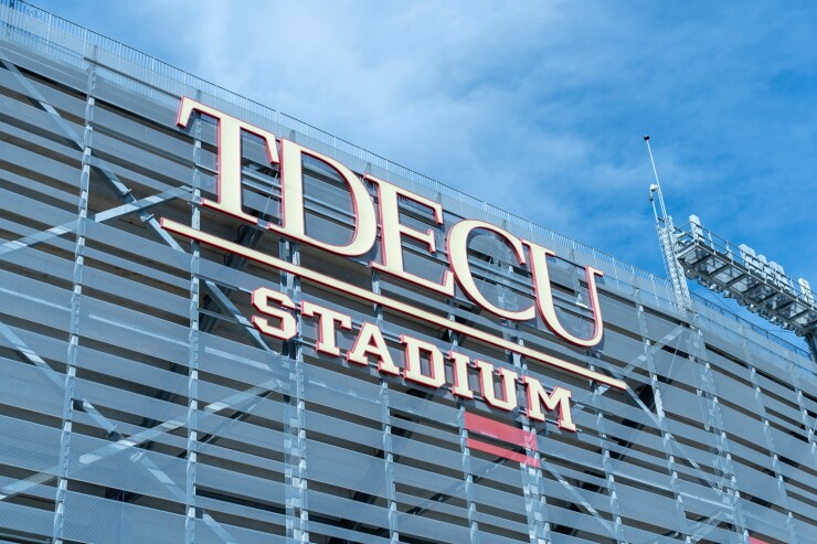 Houston, Texas, USA - April 5, 2024: UH (University of Houston) logo sign on the building at TDECU Stadium in Houston, Texas, USA.