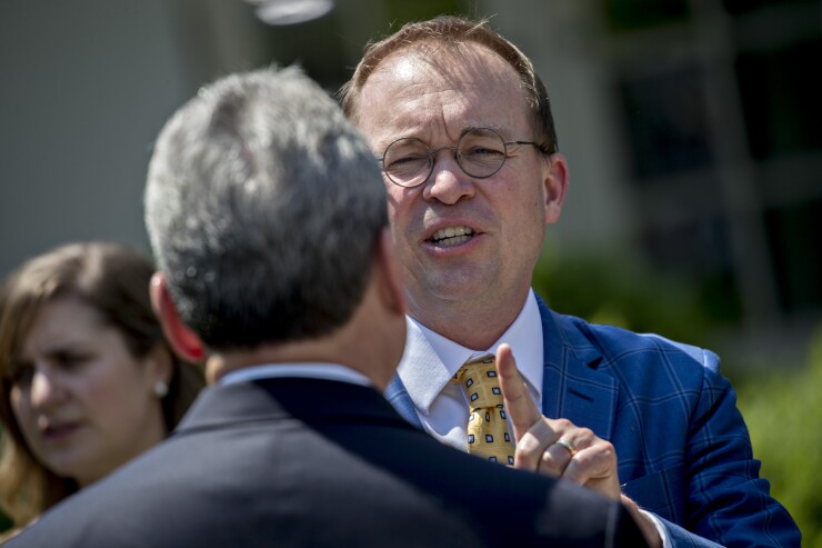 Acting CFPB Director Mick Mulvaney, also head of OMB (Office of Management and Budget)