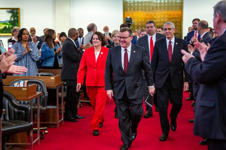 North Carolina House Speaker Tim Moore, R-Cleveland (center).