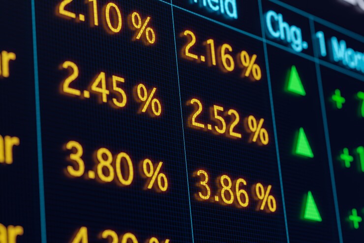 Close-up rising interest rates on the screen.