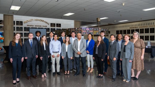 Students at the University of Texas at Austin's McCombs School of Business posed in 2024 around Ramesh K.S. Rao, the founding director of the school's Langston Wealth Management Center and Candace and John Langston of Republic Capital Group, the wealth management investment bankers whose gifts to the university launched a fellowship program in 2022 and, two years later, the Langston Wealth Management Center.