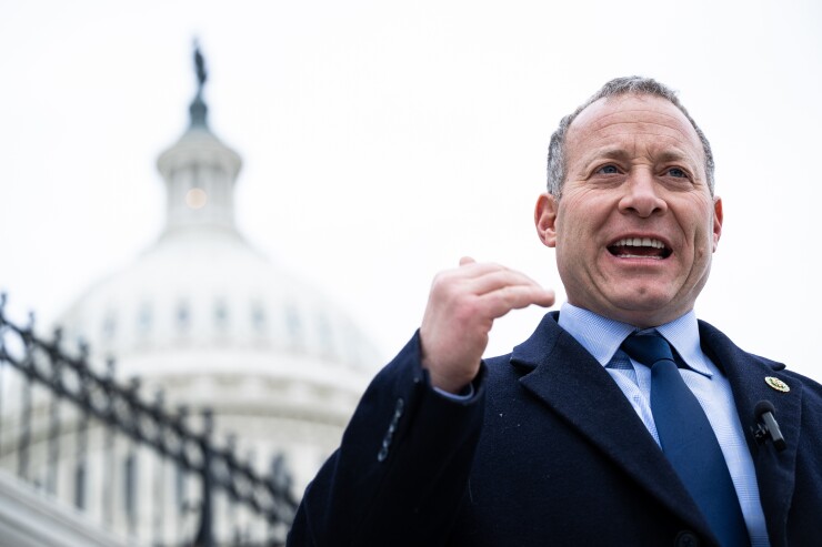 Representative Josh Gottheimer speaks to members of the media outside the Capitol in Washington.