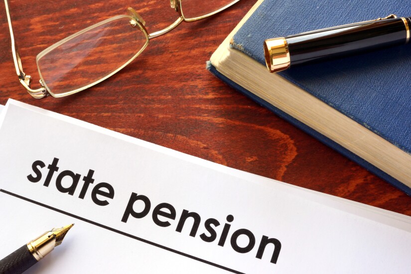 Paper with title state pension on a table.