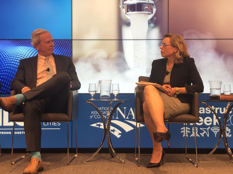 Left to right, Ted Henifin, general manager of the Hampton Roads Sanitation District and Kyle Dreyfuss-Wells, chief executive officer at the Northeast Ohio Regional Sewer District discuss smart water during Infrastructure Week.