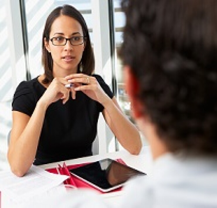 Person interviewing someone for a job