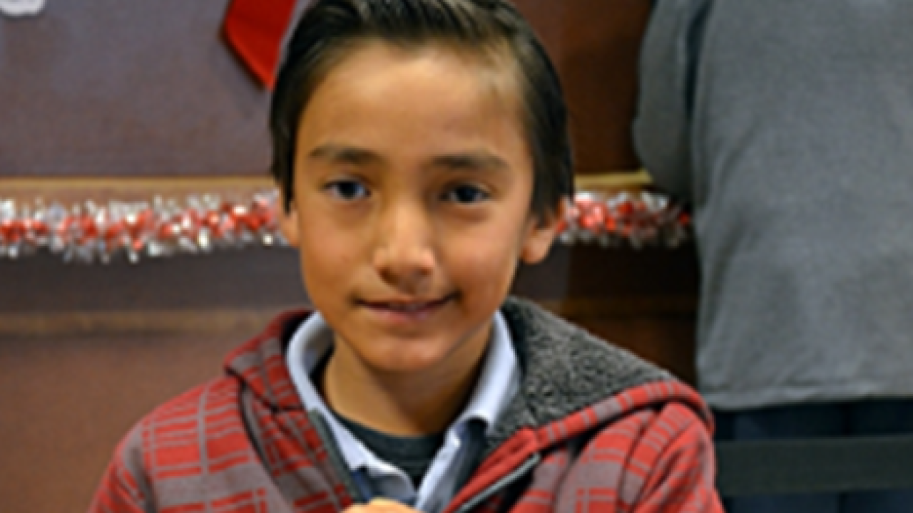 A young member of Rio Grande CU, a CDFi and Juntos Avanzamos-designated credit union.